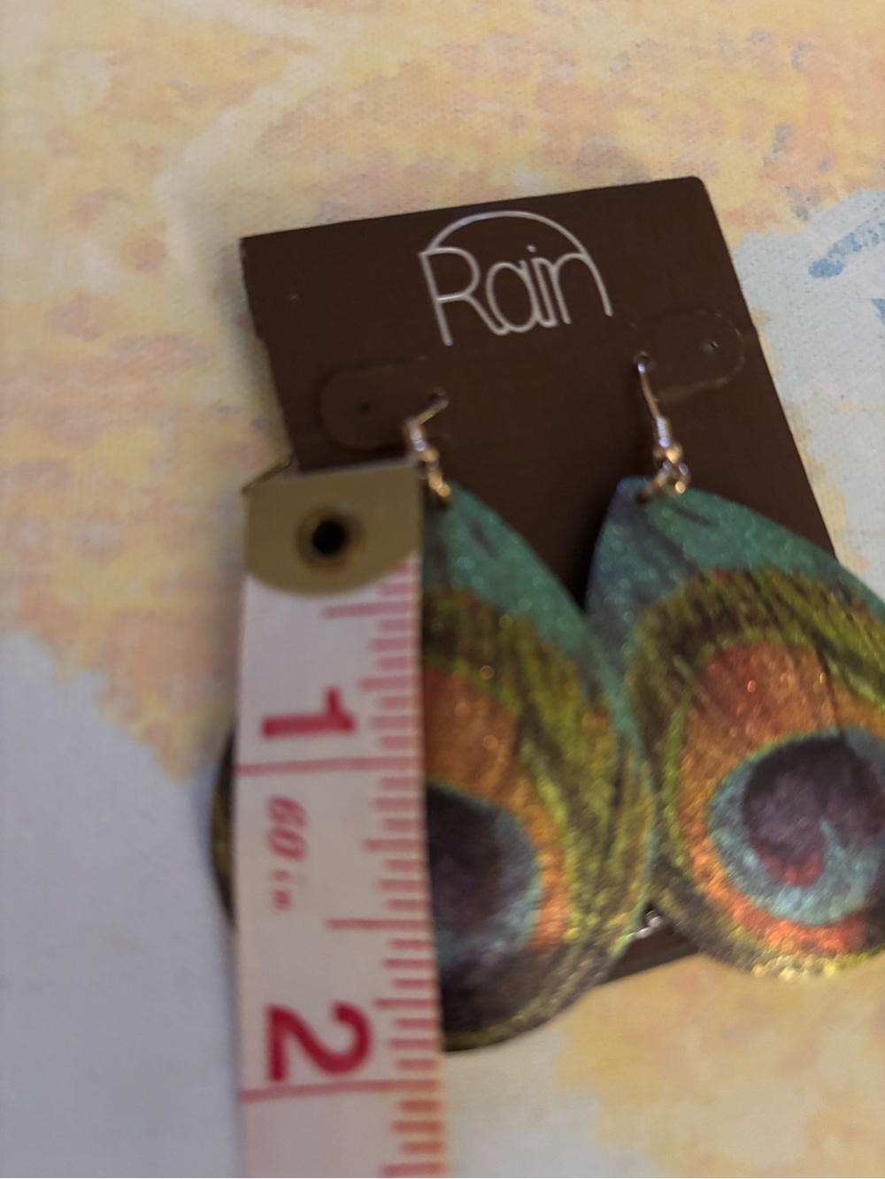 Peacock painted earrings by Rain. 2 inches long gold-tone look backings $9.00 - Picture 2 of 4